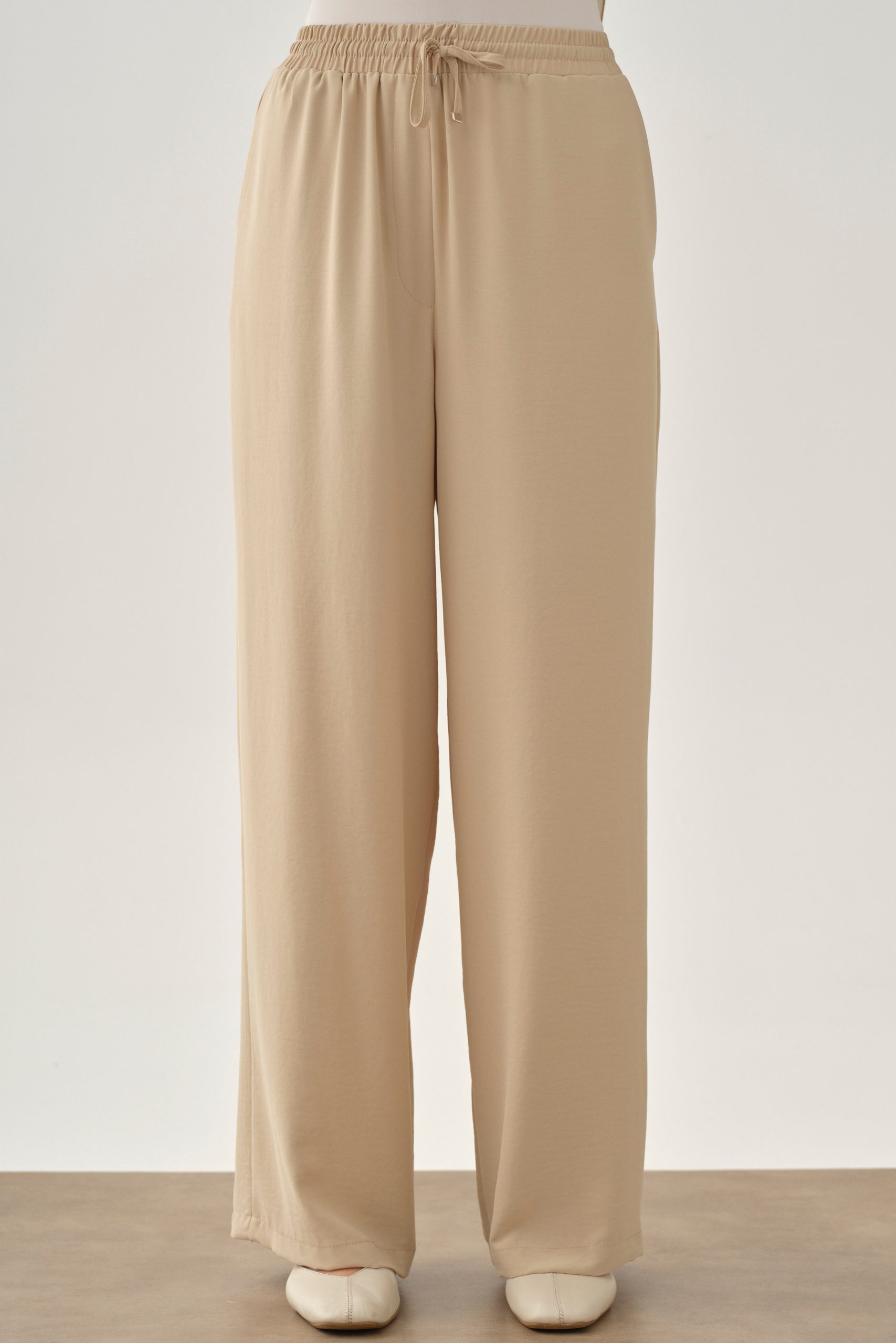 beli-lastikli-cepli-pantolon-bej-102271.jpg
