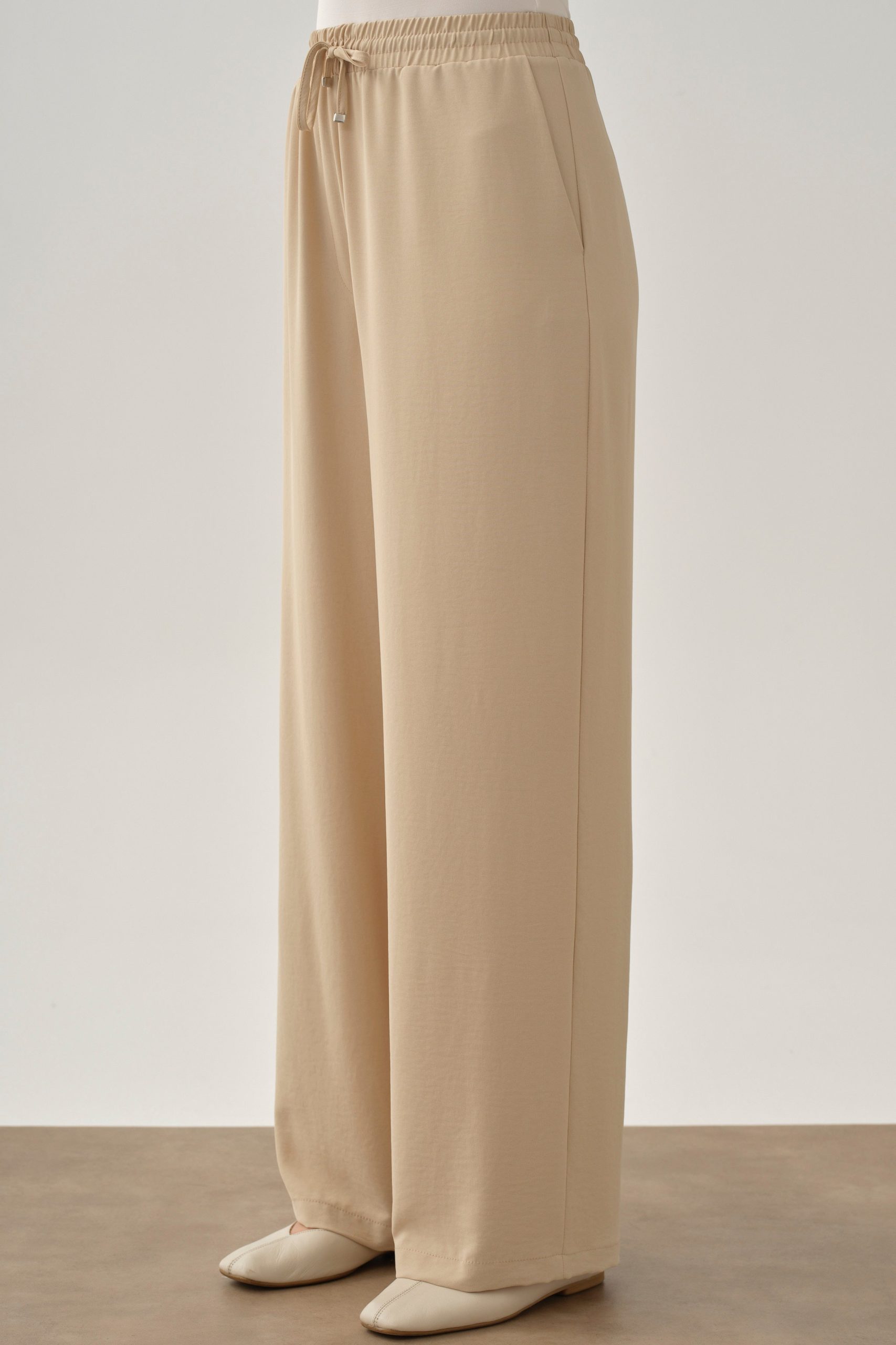 beli-lastikli-cepli-pantolon-bej-102272.jpg