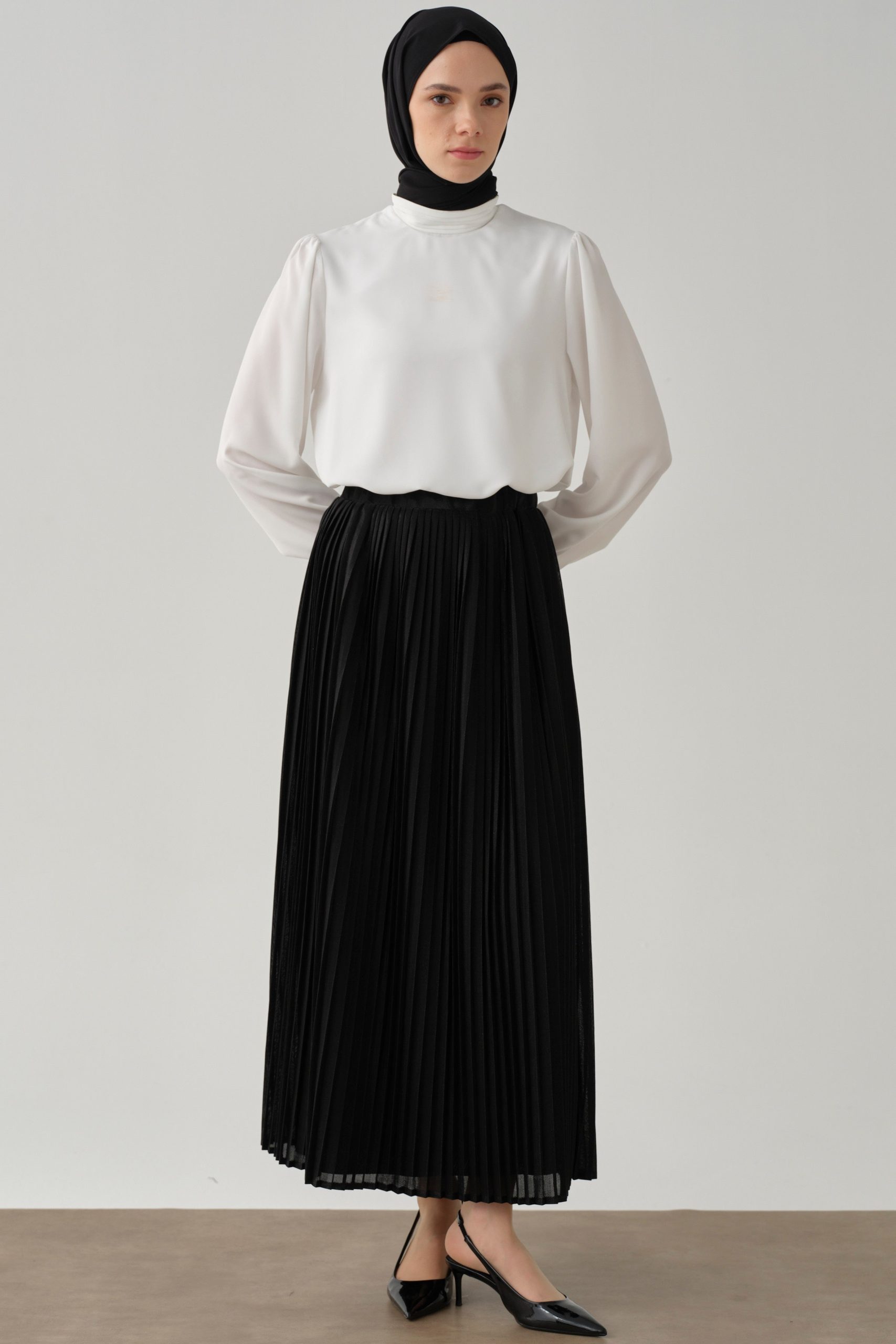 beli-lastikli-plise-etek-siyah-97919.jpg