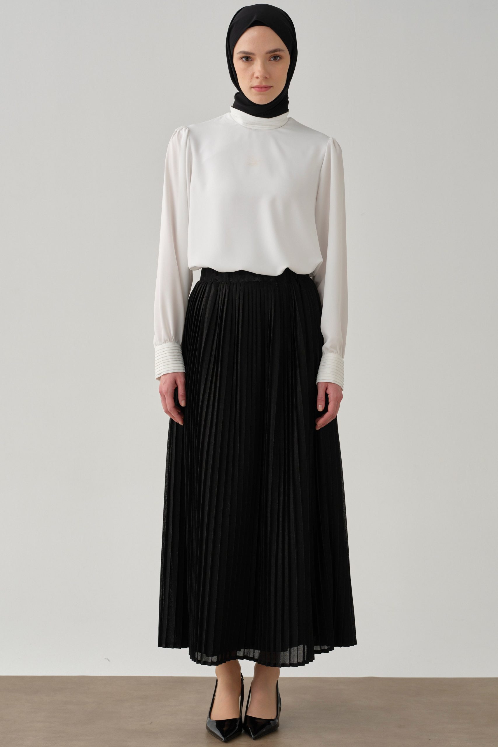 beli-lastikli-plise-etek-siyah-97920.jpg