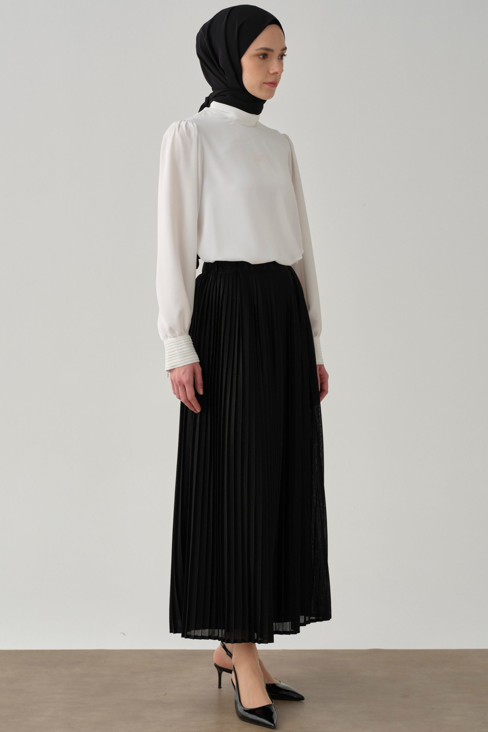 beli-lastikli-plise-etek-siyah-97921.jpg