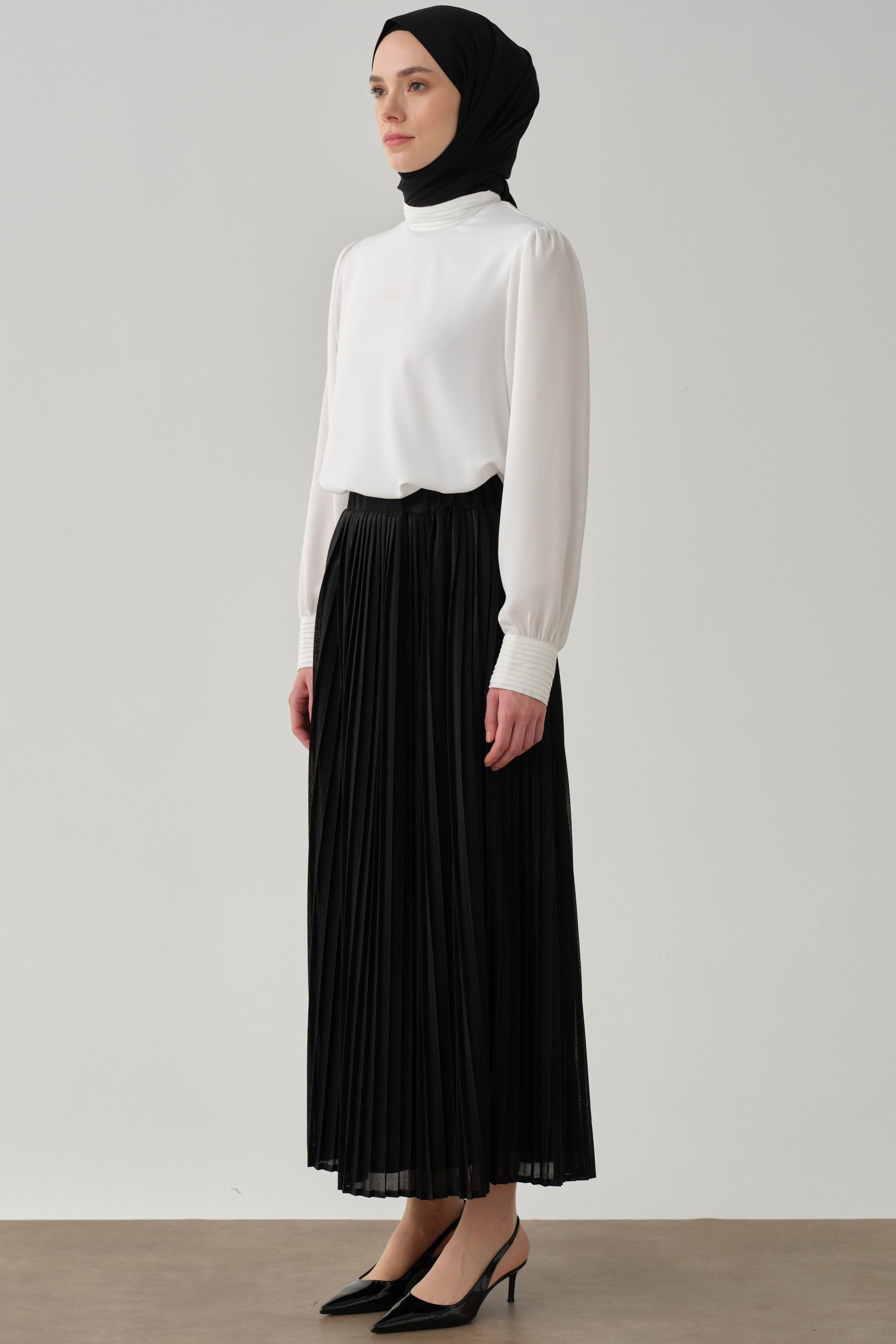 beli-lastikli-plise-etek-siyah-97922.jpg