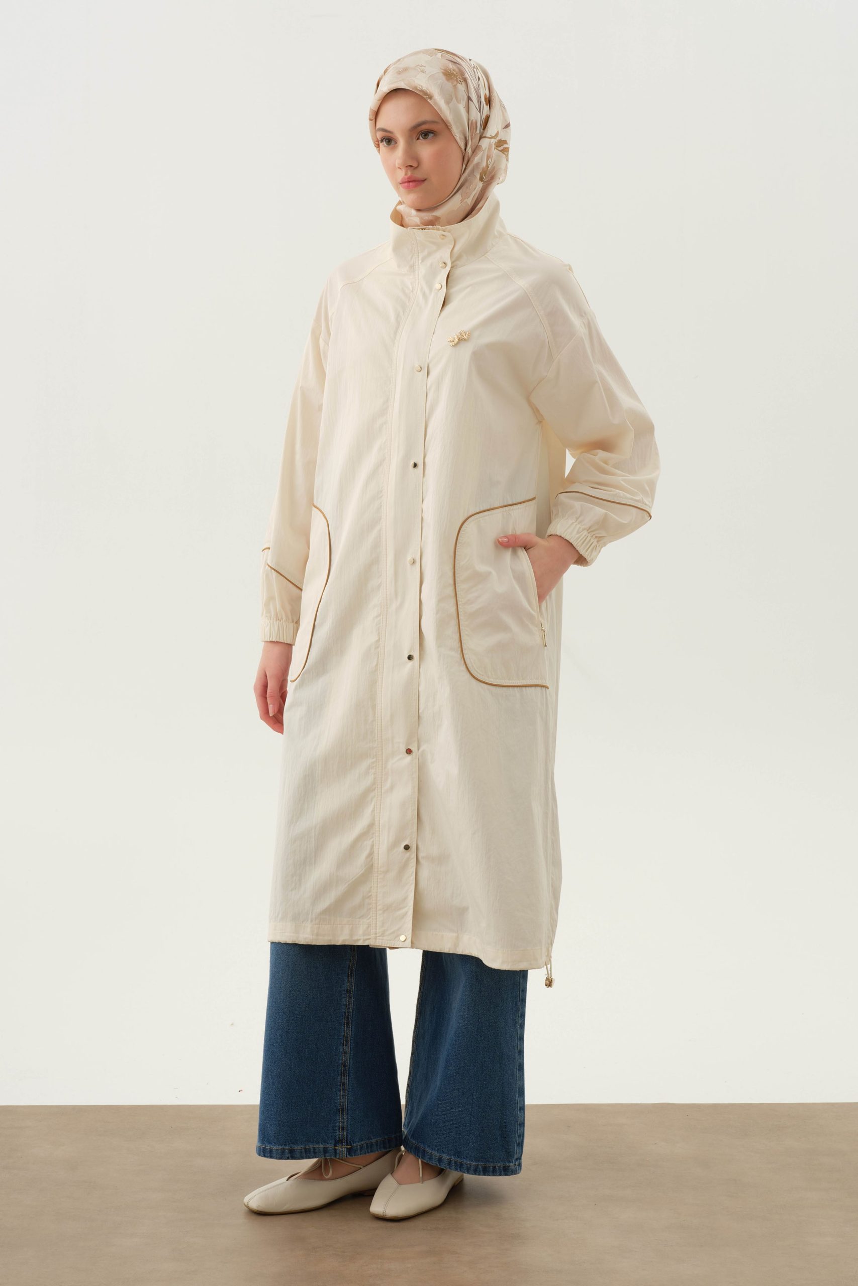 biyeli-yagmurluk-ekru-99835.jpg