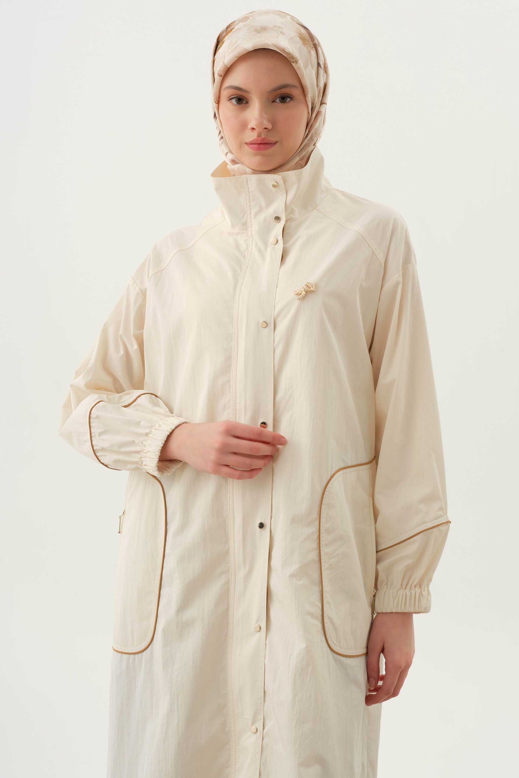 biyeli-yagmurluk-ekru-99838.jpg