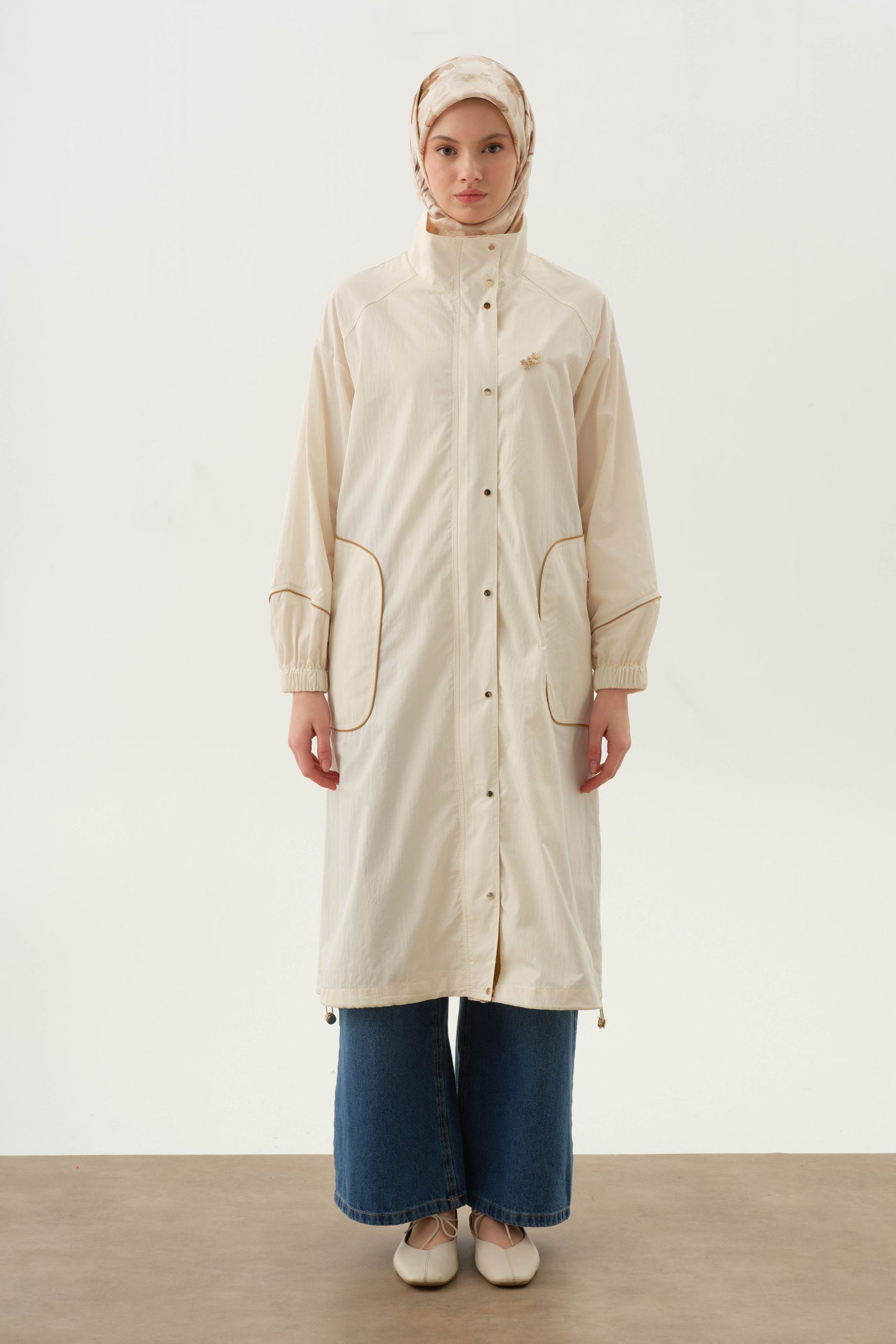 biyeli-yagmurluk-ekru-99840.jpg